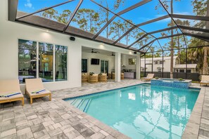 Outdoor pool, a heated pool - The Naples Luxe Retreat . Game Room • Heated Pool (Naples)