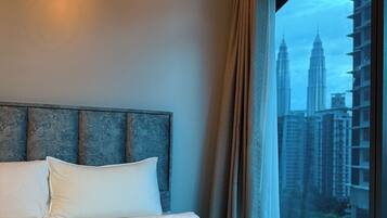 Deluxe Apartment, City View | Desk, laptop workspace, soundproofing, iron/ironing board