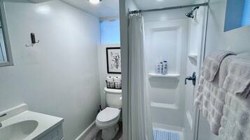 Hair dryer, towels, soap, toilet paper