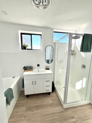 Shower, hair dryer, towels, soap