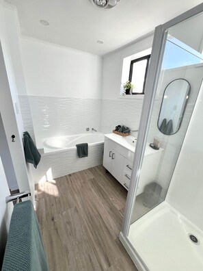 Shower, hair dryer, towels, soap