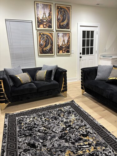 Luxury Gold & Black Retreat 
2-bedroom condo