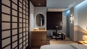 A modern hotel room with a bed, a wooden dresser, a desk with a chair, a mirror, and a window with blinds. - Stay Passport Okinawa Ryokan Bupyeong Incheon (Incheon)
