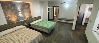Costa Ayala suite 1 with 2 dbl bed and 2 sofas, all basics, 2 blocks from beach