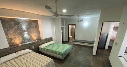 Costa Ayala suite 1 with 2 dbl bed and 2 sofas, all basics, 2 blocks from beach