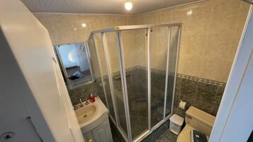 Shower, towels, soap, shampoo