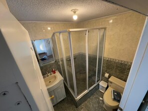 Shower, towels, soap, shampoo