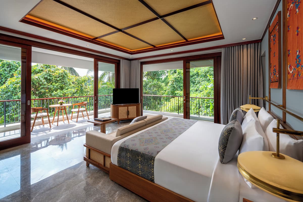 Suite estándar, vista al jardín | Artículos del minibar gratis y caja de seguridad en la habitación