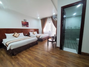 Deluxe Room, 2 Queen Beds | Premium bedding, desk, laptop workspace, blackout drapes