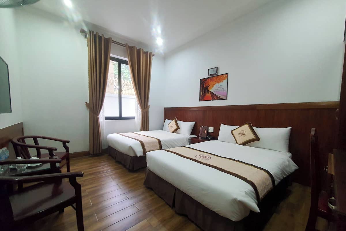 Family Room | Premium bedding, desk, laptop workspace, blackout drapes