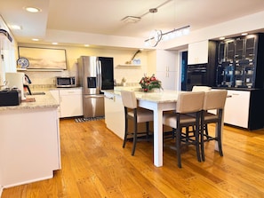 Microwave, oven, stovetop, dishwasher - Immersive Themed Luxury Getaway-W/th- Hot Tub/Theater/Game Room/Gym-Sleeps Large (Girard)