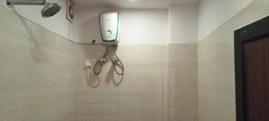 Deluxe Room | Bathroom | Shower, toilet paper