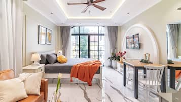 Deluxe Studio, Balcony, City View | Iron/ironing board, free WiFi