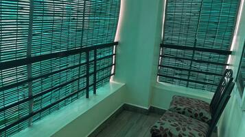 Family Apartment, Balcony | Living area | Flat-screen TV