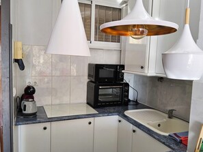 Fridge, microwave, oven, cookware/dishes/utensils