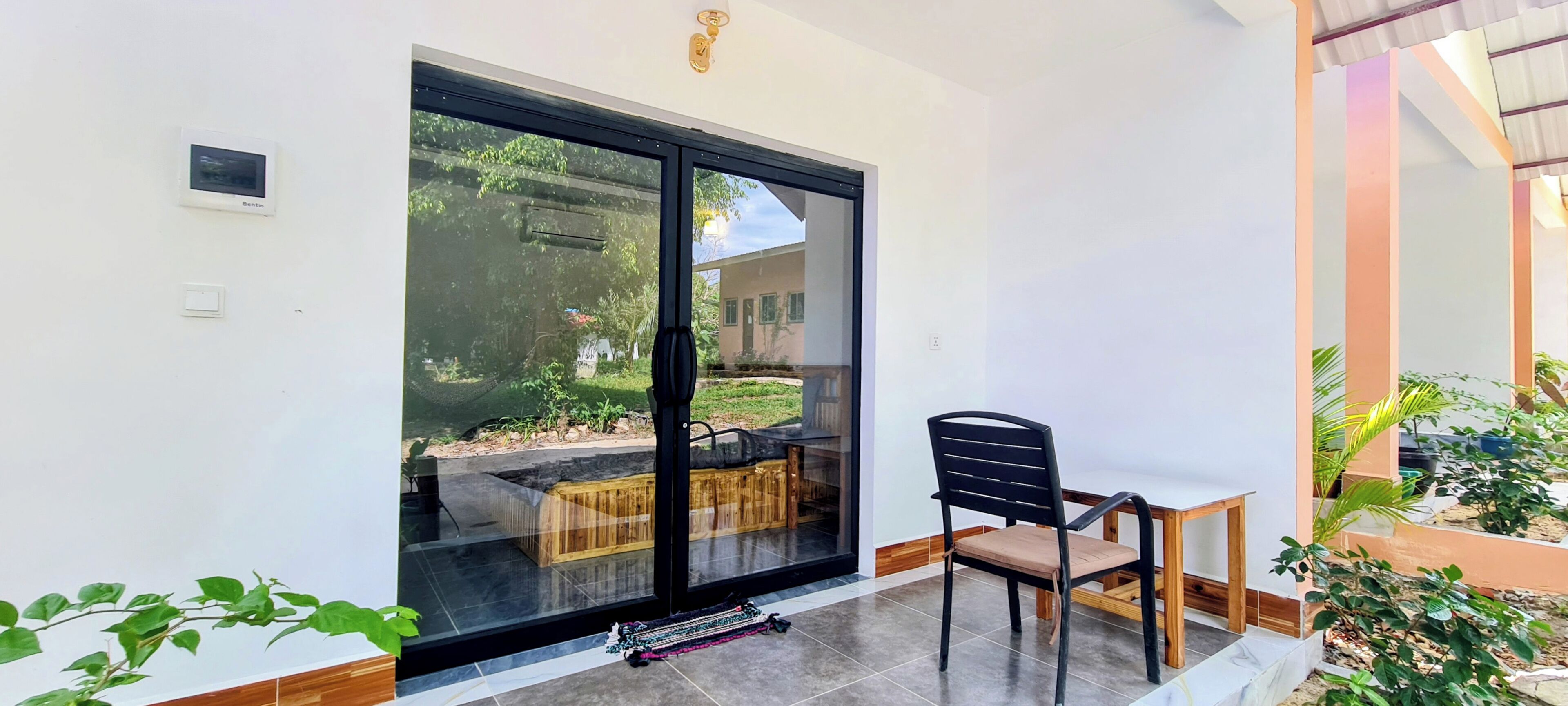 Basic Bungalow, Balcony, Garden View | Terrace/patio