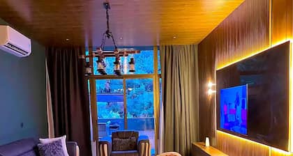 This 2 bedroom retreat features elegant interiors, a serene private garden.