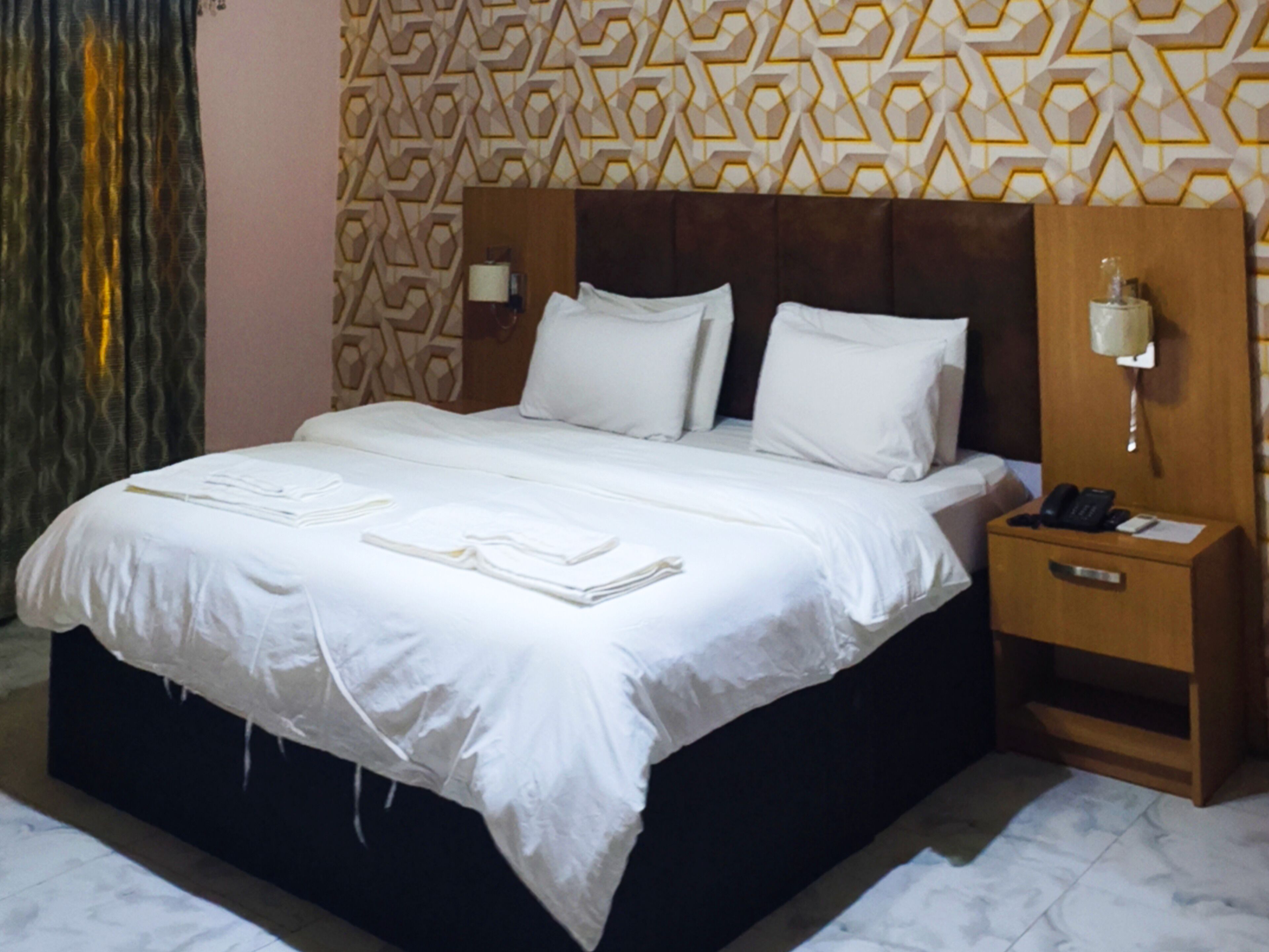 In-room safe, blackout curtains, soundproofing, bed sheets