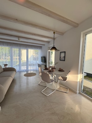 Design Cottage, 2 Bedrooms | Living area | TV - Białe Tarasy Rogowo (Rogowo)
