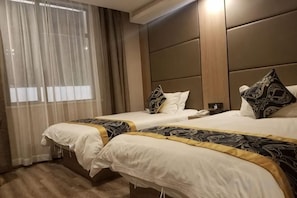 A hotel room with two beds, a large window with sheer curtains, a wooden headboard, and a bedside table with a lamp. - Shanghai Baoyue Hotel (Hongqiao Wuzhong Road Branch) (Shanghai)