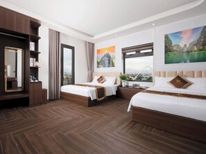 Family Room, Balcony, City View | Laptop workspace, free WiFi