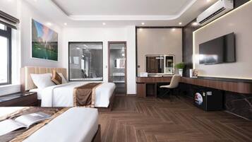 Family Room, Balcony, City View | Laptop workspace, free WiFi