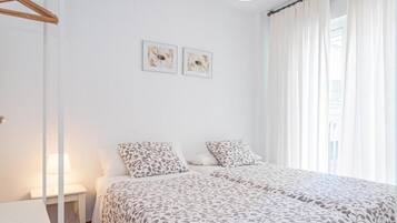 2 dormitorios, tabla de planchar con plancha, wifi y ropa de cama