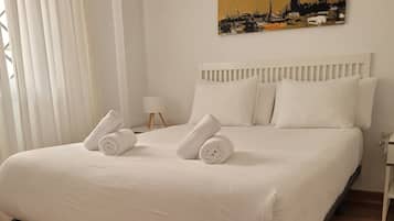 2 dormitorios, tabla de planchar con plancha, wifi y ropa de cama