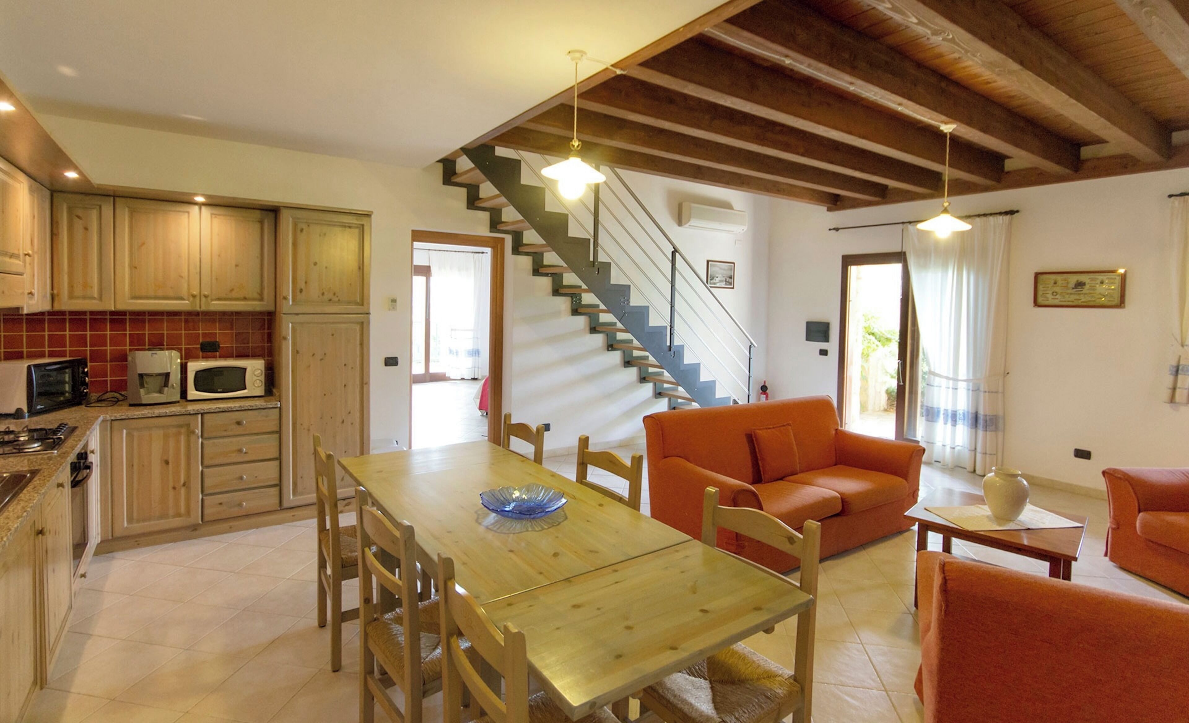 Superior Suite | Living area | 24-inch flat-screen TV with satellite channels