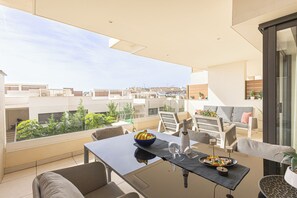Family Apartment, Multiple Bedrooms, 2 Bathrooms (Lotus Jardinana Paradise) | Outdoor dining - Lotus Jardinana Paradise (Mijas)