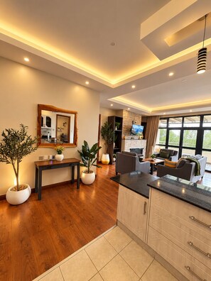 reception, indoor, couch, television, shared space