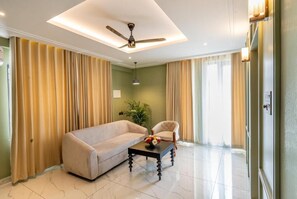 Habitación superior | Área de sala de estar