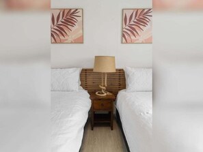 2 habitaciones, tabla de planchar con plancha, wifi y ropa de cama 