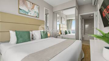 Apartment, 2 Bedrooms, City View | Desk, laptop workspace, iron/ironing board, free WiFi