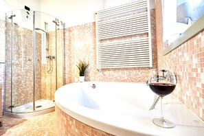 Luxury Penthouse, City View | Bathroom | Shower, rainfall showerhead, free toiletries, hair dryer - Atlas Apartments (Bergamo)