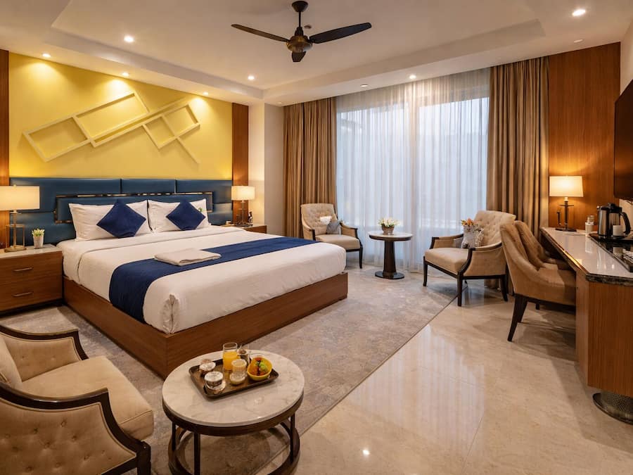 Deluxe Room, 1 Bedroom, Balcony, City View | Premium bedding, down comforters, memory foam beds, in-room safe
