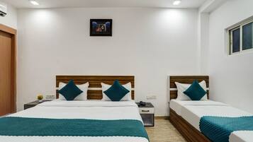 Family Double Room, Balcony, City View | In-room safe, soundproofing, iron/ironing board, free WiFi