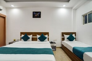 Family Double Room, Balcony, City View | In-room safe, soundproofing, iron/ironing board, free WiFi