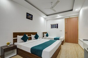 Premium bedding, down comforters, memory foam beds, in-room safe