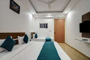 Family Double Room, Balcony, City View | In-room safe, soundproofing, iron/ironing board, free WiFi