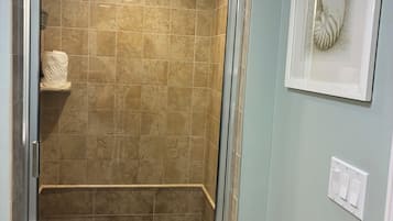 Shower, hair dryer, towels, soap