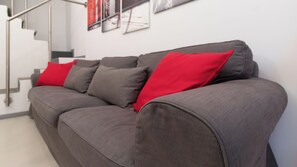 Apartment (2 Bedrooms) | Living area | 32-inch TV with cable channels