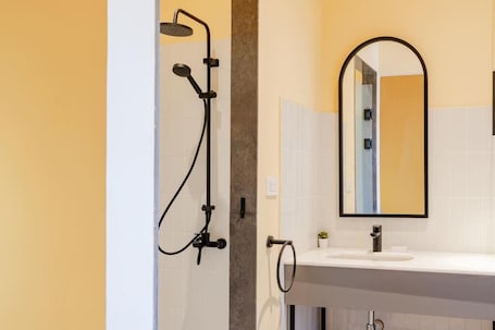 Shower, free toiletries, towels, soap