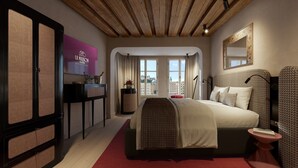 A modern hotel room with a large bed, a TV, a console table, and a view of the city. - La Maison (Salzburg)