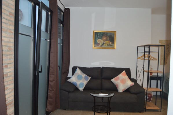 Superior Studio | Living area | 49-inch LED TV with premium channels, first-run movies, pay movies