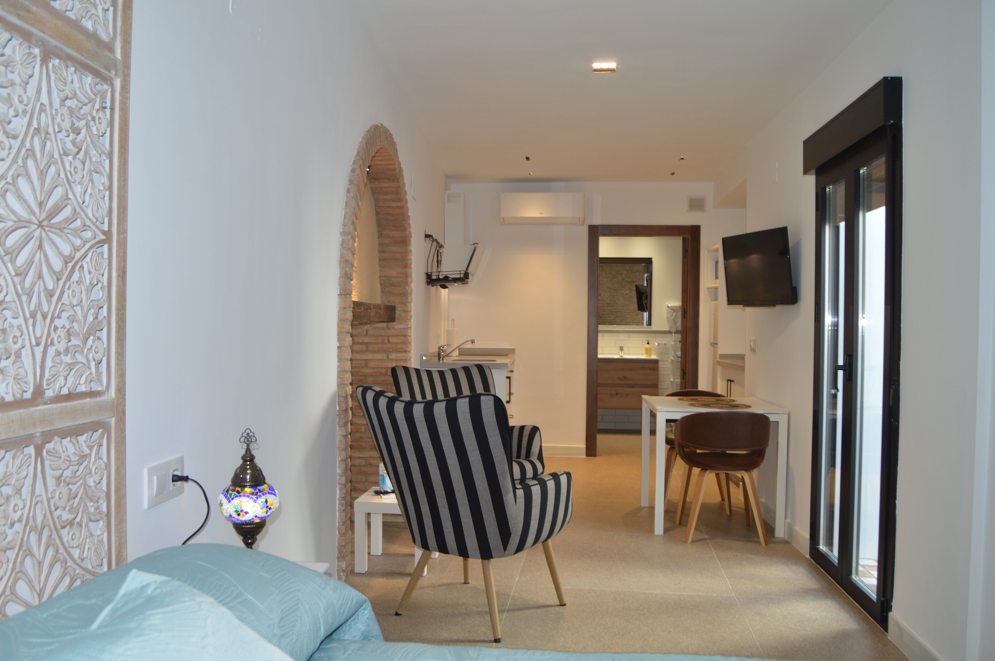 Superior Studio | Living area | 49-inch LED TV with premium channels, first-run movies, pay movies