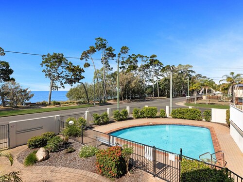 Bright Coastal Stay With Pool and Beach View