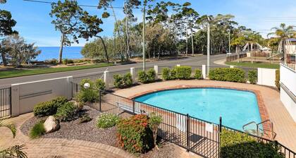 Bright Coastal Stay With Pool and Beach View