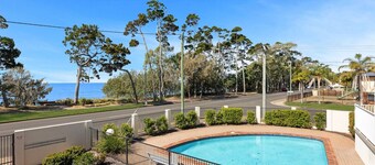 Bright Coastal Stay With Pool and Beach View