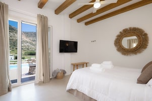Superior Suite, Pool View | In-room safe, free WiFi, bed sheets